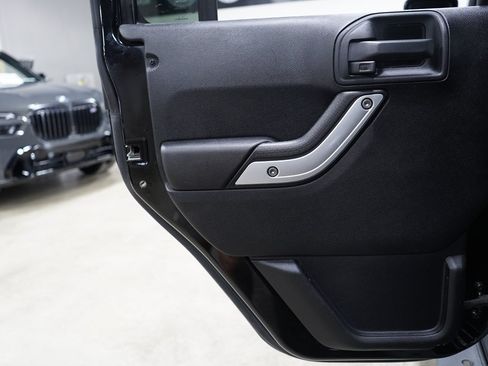 Used 2015 Jeep Wrangler Unlimited Sahara w/ Dual Top Group AWD/4WD image 13