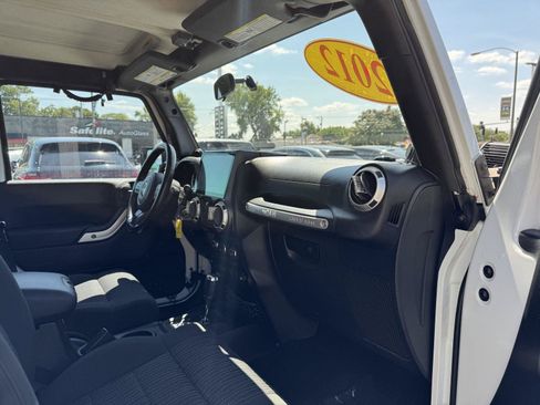 Used 2012 Jeep Wrangler Unlimited Sahara w/ Dual Top Group AWD/4WD image 36