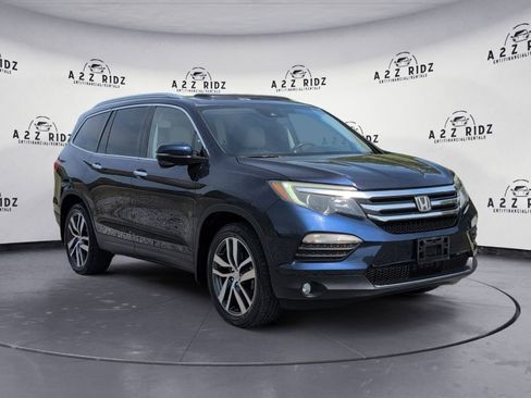 Used 2016 Honda Pilot Touring image 1