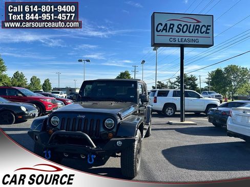 Used 2012 Jeep Wrangler Unlimited Sahara AWD/4WD image 1