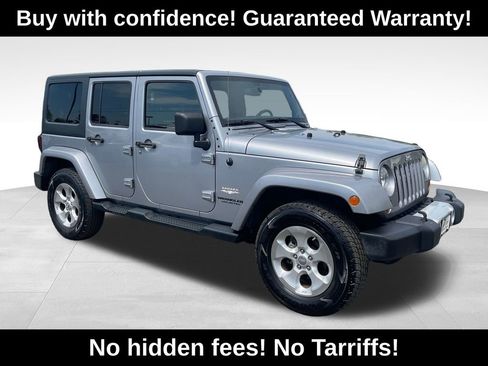 Used 2013 Jeep Wrangler Unlimited Sahara AWD/4WD image 1
