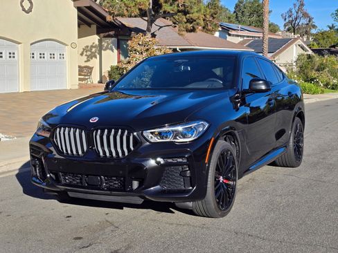 Used 2023 BMW X6 M50i w/ Executive Package image 1