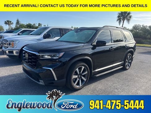 Used 2024 Honda Pilot Touring image 1