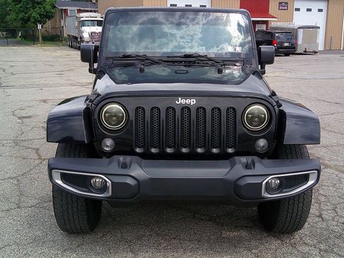 Used 2014 Jeep Wrangler Unlimited Sahara w/ Dual Top Group AWD/4WD image 2