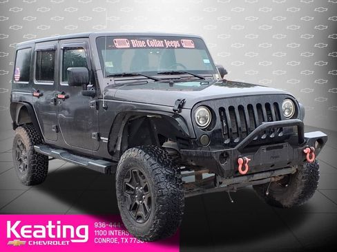 Used 2014 Jeep Wrangler Unlimited Sahara w/ Connectivity Group AWD/4WD image 1
