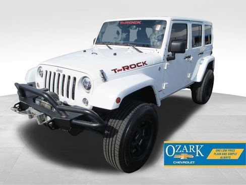 Used 2014 Jeep Wrangler Unlimited Sahara w/ Dual Top Group AWD/4WD image 1