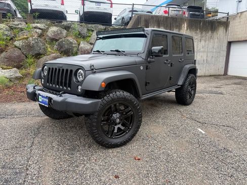 Used 2015 Jeep Wrangler Unlimited Sahara AWD/4WD image 1