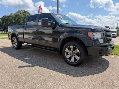Used 2013 Ford F150 FX4 w/ Mid Equipment Group AWD/4WD image 1