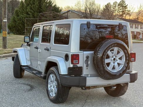 Used 2012 Jeep Wrangler Unlimited Sahara w/ Dual Top Group image 12