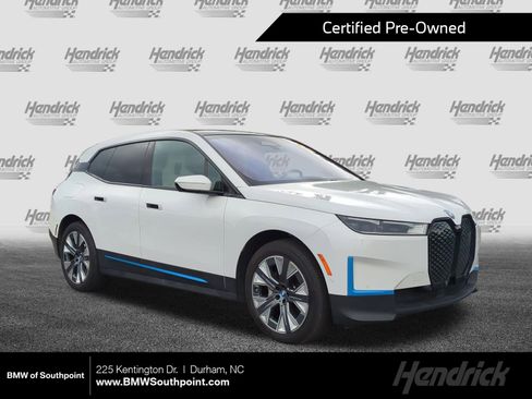 Used 2023 BMW iX xDrive50 w/ BMW I Signature Blue Package AWD/4WD image 1