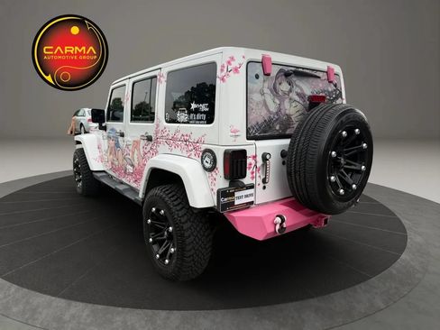 Used 2013 Jeep Wrangler Unlimited Sahara w/ Connectivity Group AWD/4WD image 3