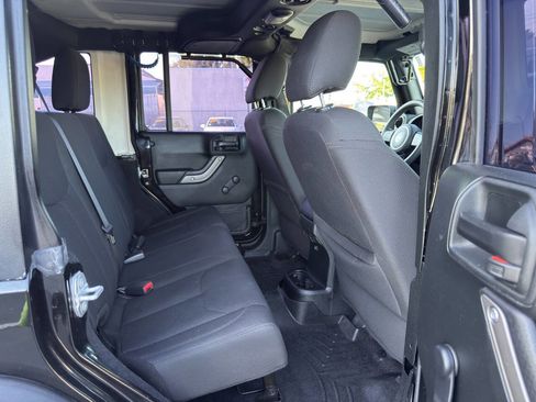 Used 2018 Jeep Wrangler Unlimited Sport w/ Mopar Black Appearance Group AWD/4WD image 14