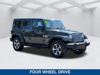 Used 2016 Jeep Wrangler Unlimited Sahara w/ Max Tow Package AWD/4WD video 3