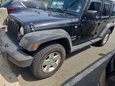 Used 2012 Jeep Wrangler Unlimited Sport AWD/4WD image 1