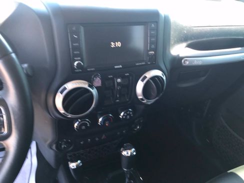 Used 2016 Jeep Wrangler Unlimited Sahara w/ Dual Top Group AWD/4WD image 30