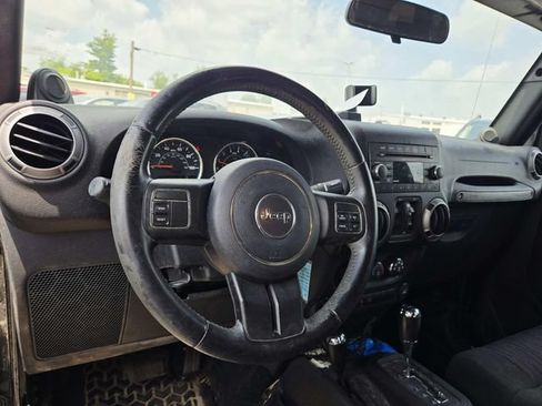 Used 2012 Jeep Wrangler Unlimited Sport AWD/4WD image 9
