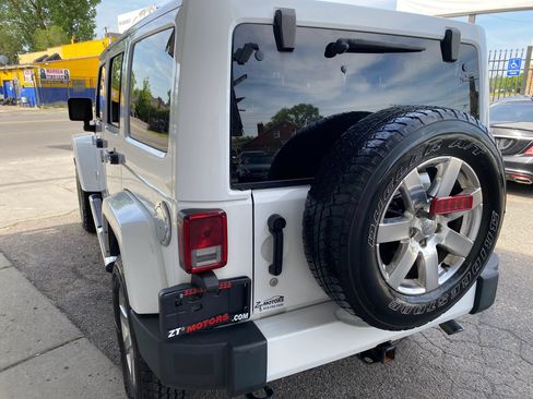 Used 2015 Jeep Wrangler Unlimited Sahara w/ Mopar Chrome Edition Group AWD/4WD image 2