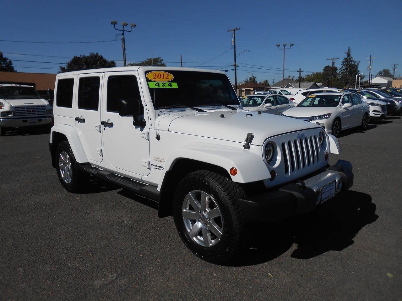 Used 2012 Jeep Wrangler Unlimited Sahara w/ Dual Top Group AWD/4WD image 3