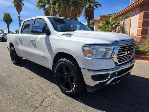 Used 2024 RAM 1500 Laramie AWD/4WD image 1