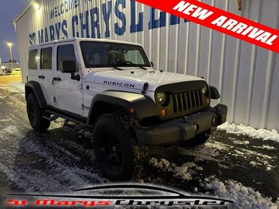 Used 2013 Jeep Wrangler Unlimited Rubicon w/ Dual Top Group