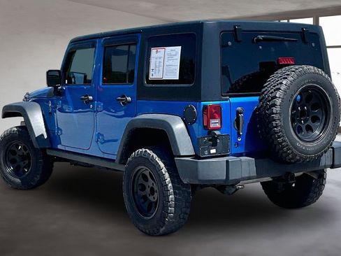 Used 2016 Jeep Wrangler Unlimited Rubicon w/ Dual Top Group AWD/4WD image 14