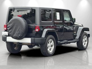 Used 2015 Jeep Wrangler Unlimited Sahara w/ Max Tow Package AWD/4WD video 2