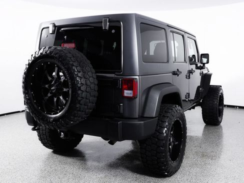 Used 2014 Jeep Wrangler Unlimited Rubicon w/ Dual Top Group AWD/4WD image 8