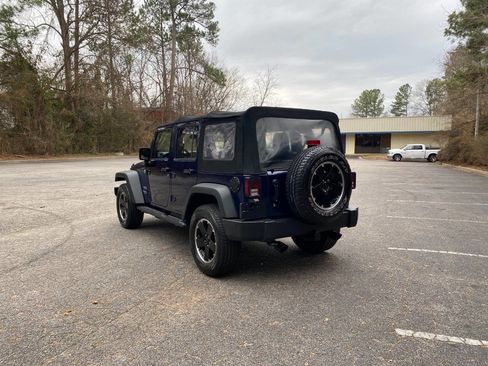 Used 2013 Jeep Wrangler Unlimited Sport w/ Mopar Black Appearance Group image 7