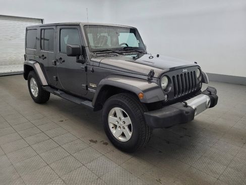 Used 2014 Jeep Wrangler Unlimited Sahara w/ Dual Top Group AWD/4WD image 13