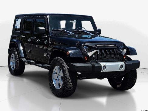 Used 2010 Jeep Wrangler Unlimited Sahara w/ Dual Top Group AWD/4WD image 2