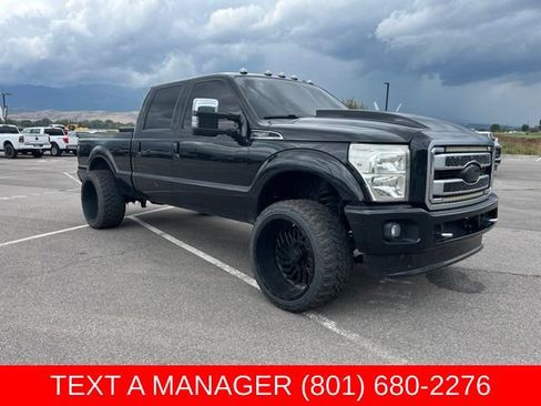 Used 2013 Ford F250 Platinum w/ FX4 Off Road Pkg AWD/4WD image 1