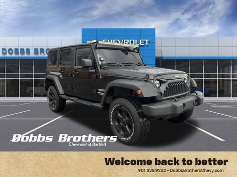 Used 2013 Jeep Wrangler Unlimited Sport image 1
