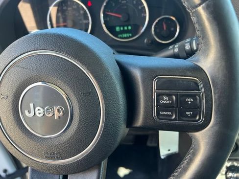 Used 2014 Jeep Wrangler Unlimited Sahara w/ Dual Top Group AWD/4WD image 22