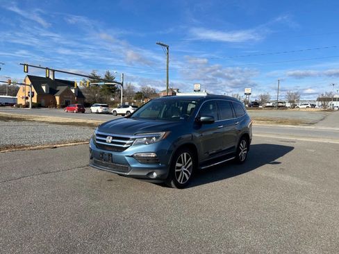 Used 2016 Honda Pilot Touring image 1