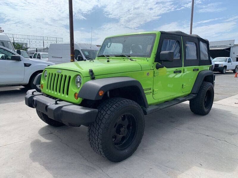 Used 2013 Jeep Wrangler Unlimited Sport w/ Mopar Black Appearance Group AWD/4WD image 3