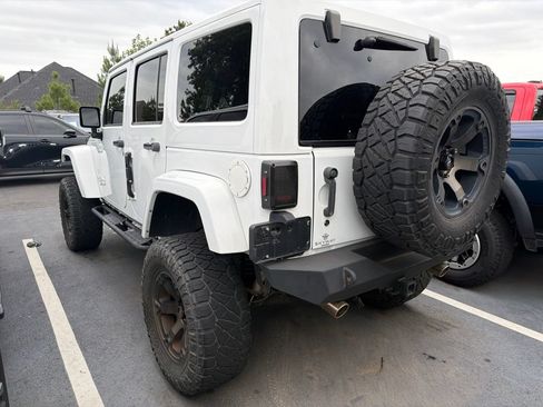 Used 2014 Jeep Wrangler Unlimited Sahara w/ Mopar Chrome Edition Group AWD/4WD image 10