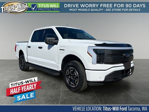 Used 2023 Ford F150 Lightning XLT AWD/4WD image 1