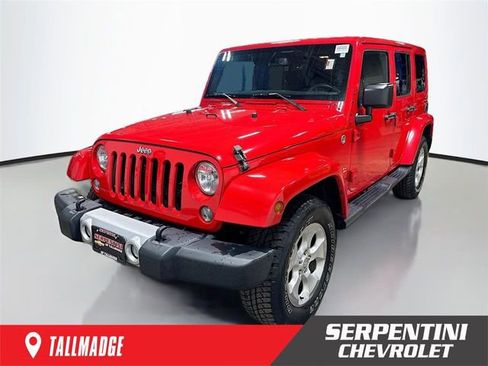 Used 2015 Jeep Wrangler Unlimited Sahara AWD/4WD image 1