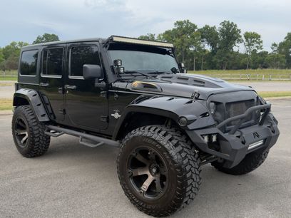 Used 2014 Jeep Wrangler Unlimited Sport