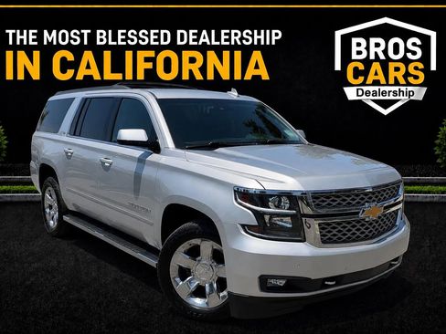 Used 2018 Chevrolet Suburban LT w/ LT Signature Package AWD/4WD image 1