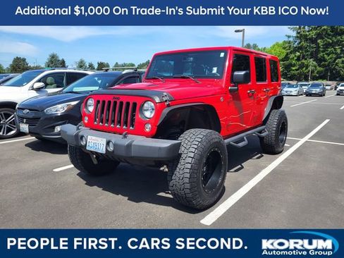 Used 2015 Jeep Wrangler Unlimited Sahara AWD/4WD image 1