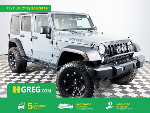 Used 2015 Jeep Wrangler Unlimited Sport image 1
