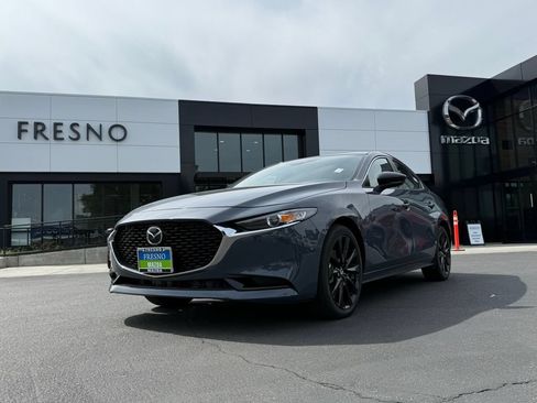 New 2026 MAZDA MAZDA3 Carbon AWD/4WD image 1