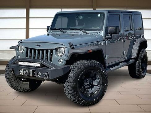 Used 2015 Jeep Wrangler Unlimited Sahara w/ Max Tow Package image 1