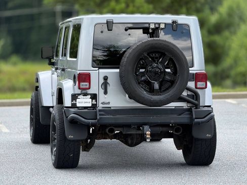 Used 2014 Jeep Wrangler Unlimited Rubicon w/ Dual Top Group AWD/4WD image 5