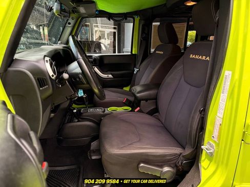 Used 2013 Jeep Wrangler Unlimited Sahara w/ Dual Top Group AWD/4WD image 22