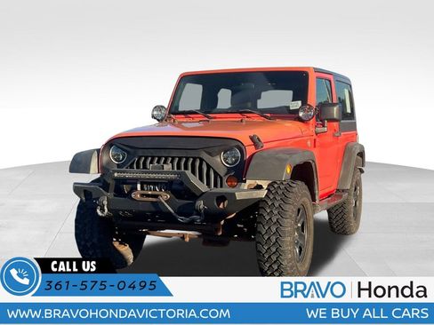 Used 2013 Jeep Wrangler Sport image 1