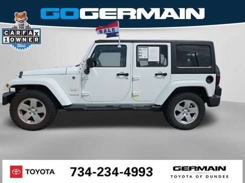 Used 2012 Jeep Wrangler Unlimited Sahara w/ Dual Top Group AWD/4WD image 12