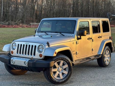 Used 2012 Jeep Wrangler Unlimited Sahara w/ Dual Top Group image 4