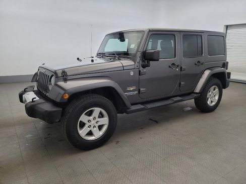 Used 2014 Jeep Wrangler Unlimited Sahara w/ Dual Top Group AWD/4WD image 2